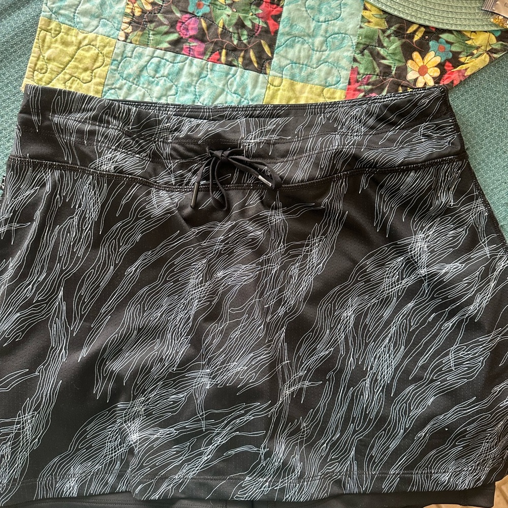 SkirtSports Black Skirt with White Patterns